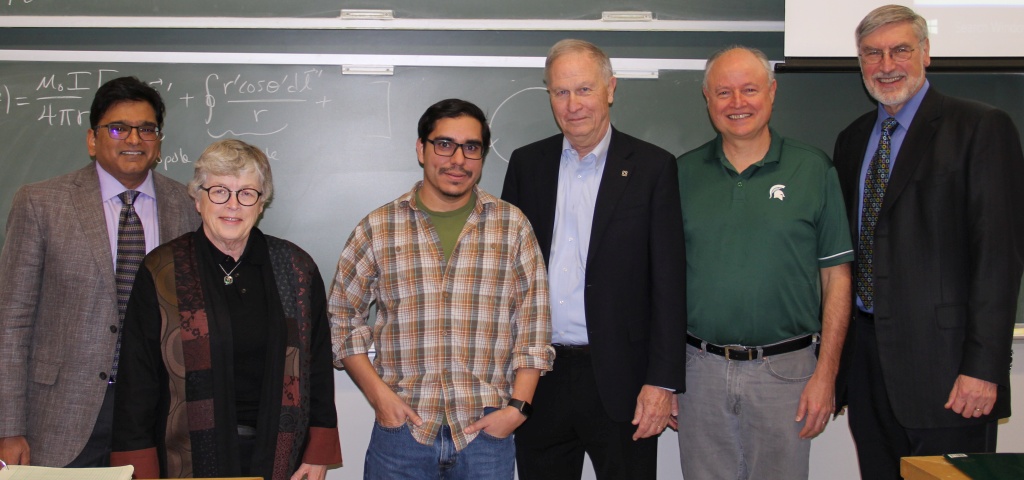 From left to right, R. Sekhar Chivukula, MSU Associate Provost for Undergraduate Education; Lou Anna K. Simon, MSU President; Danny Caballero, the recipient of the award; Carl Liedholm, the donor who established the award; Phillip Duxbury, chair of the MSU Physics & Astronomy Dept.; R. James Kirkpatrick, Dean of the MSU College of Natural Science